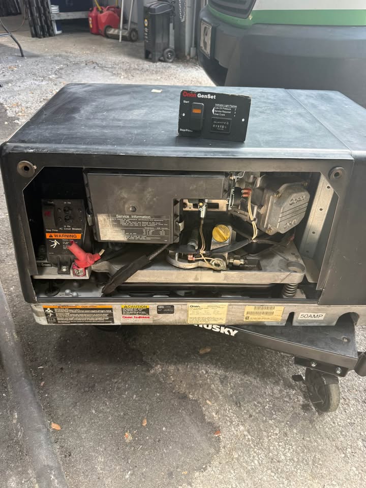 Onan 5500 carbureted generator opened up for service and load testing